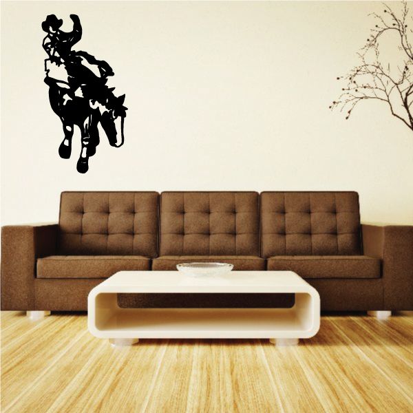 Bull riding vinyl wall decal with black rider silhouette