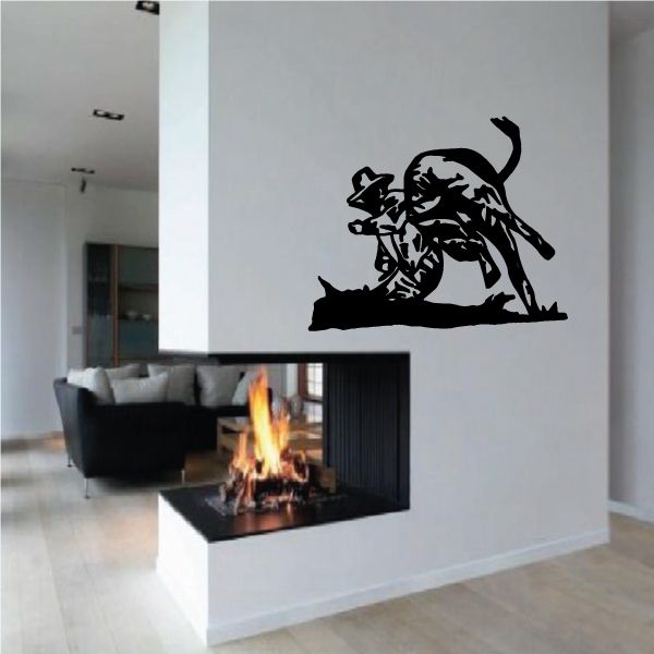 Bull riding wall decal showing a black cowboy and bull silhouette