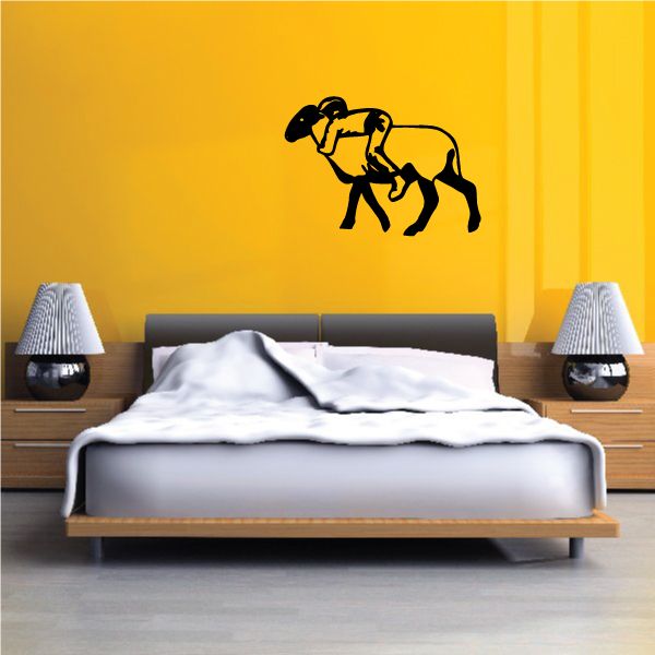 Bull riding wall decal with black rider and bull silhouette