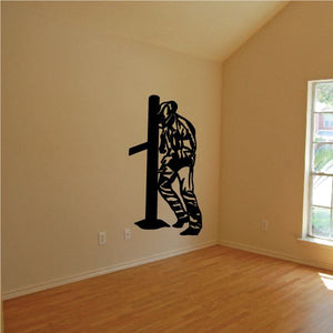 Bull riding wall decal, black silhouette of rider on standing bull