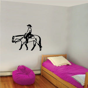 Bull rider wall decal, black silhouette of cowboy holding lasso and standing by bucking bull