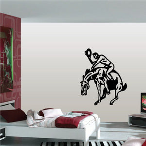 Bull riding vinyl wall decal with black bull rider silhouette