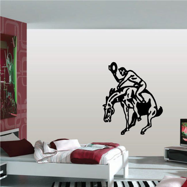 Bull riding vinyl wall decal with black bull rider silhouette