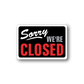 Closed business sign vinyl decal reading "Sorry, we're closed".