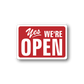 Red vinyl sign sticker: 'Yes we're OPEN' in white with border