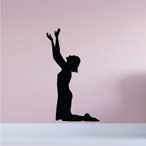 Kneeling praying woman silhouette decal with hands raised