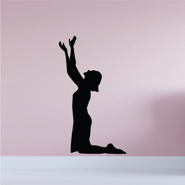 Kneeling praying woman silhouette decal with hands raised