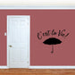 Wall decal: cursive 'C'est la Vie!' with black umbrella
