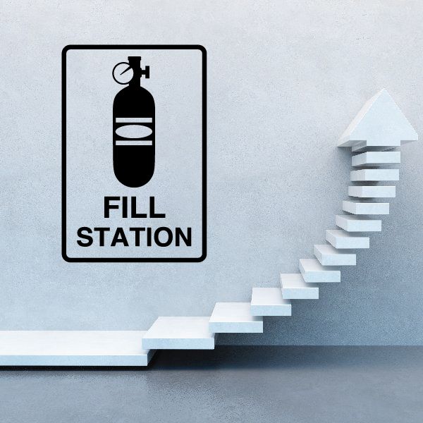 Vinyl wall decal sign with black paintball bottle icon and 'FILL STATION' text