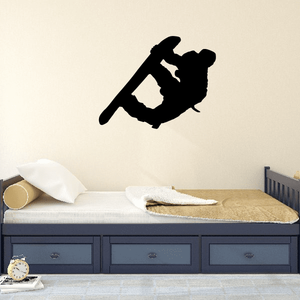 Black snowboarding silhouette decal, snowboarder in mid-action