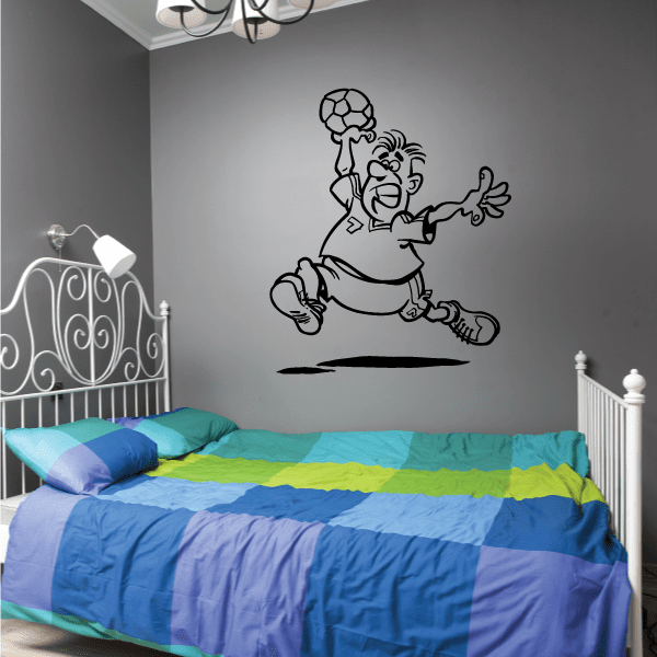 Cartoon rugby player running wall decal, holding a rugby ball