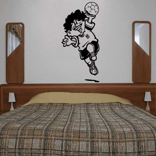 Cartoon soccer goalie wall decal, black-and-white player holding a soccer ball
