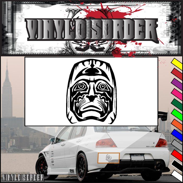 Carved tiki head decal with black tribal face design