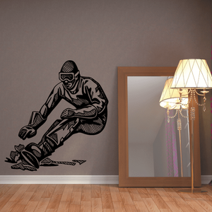 Black snowboarding wall decal with seated snowboarder graphic, textured outline.