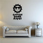 Catch Some Rays wall decal, black cartoon sun with sunglasses and bold text