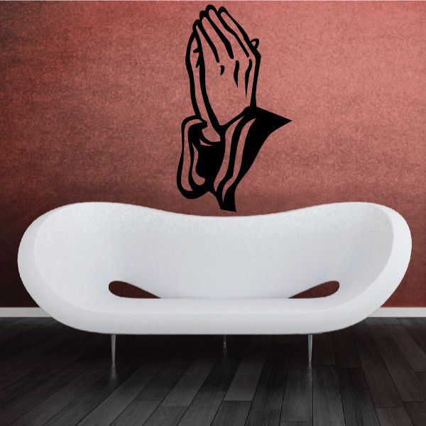 Praying hands decal on white oval backing, black outline icon