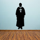 Catholic priest decal of black robed priest with white cross emblem