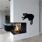 Black raccoon wall decal with raised paw