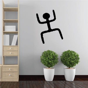 Black cave-painted stick figure wall decal, raised arms