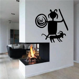 Black hunter wall decal with small dog and spiral cave painting motif