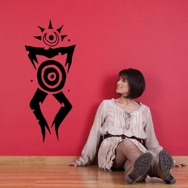 Black cave painting-style woman wall decal with spiral circle designs