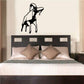 Charging ram decal, black silhouette of ram charging on light surface