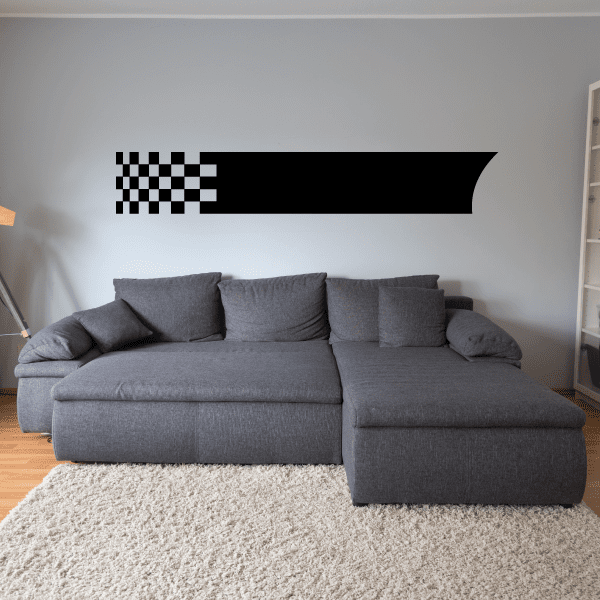 Checkered flag wall decal with black banner on a wall