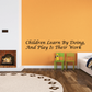 Wall decal with cursive quote: Children Learn By Doing, And Play Is Their Work