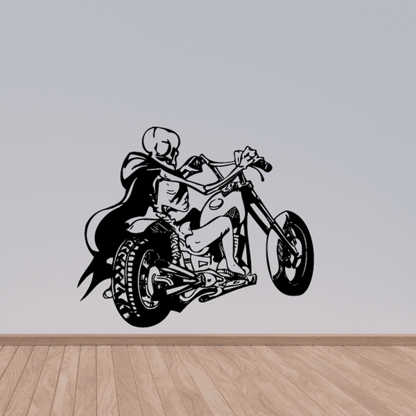 Black vinyl wall decal of a cartoon rider on a motorcycle