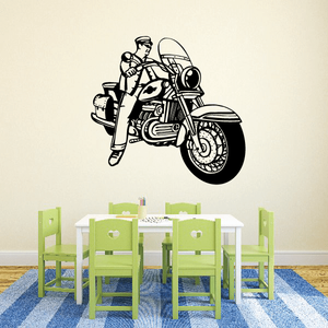 Motorcycle wall decal of a rider on a classic bike, black vinyl graphic