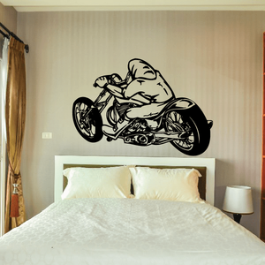 Chopper motorcycle wall decal in black vinyl, bold outline on a smooth surface
