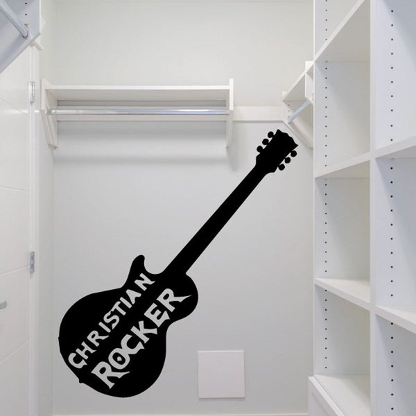 Black guitar-shaped decal with white text reading “CHRISTIAN ROCKER”