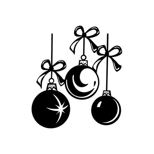 Set of three black bauble ornaments with ribbon bows and moon/star symbols