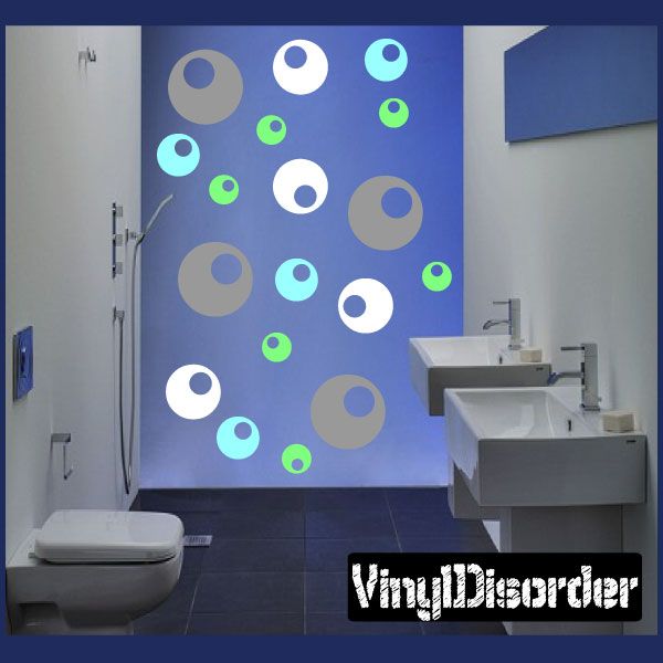 Circle with hole wall decal kit with assorted colored ring stickers on a wall