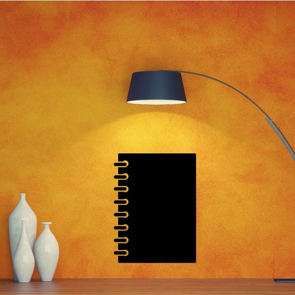 Black notebook decal with yellow spiral binding and wire outline, classroom-style