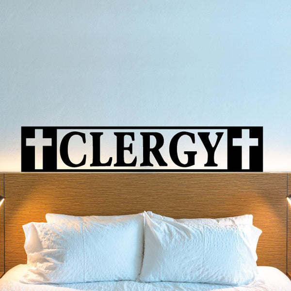 Clergy decal with black background, white cross icons, and bold “CLERGY” lettering