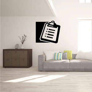 Clipboard icon decal with black background and white clipboard graphic