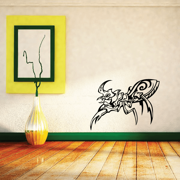 Tribal horned beetle decal, black stylized insect design