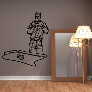 Black pool player wall decal: man holding a cue above a pool table outline.