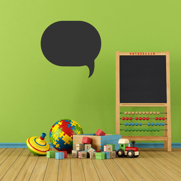 Dark gray round speech bubble decal with slim curved tail