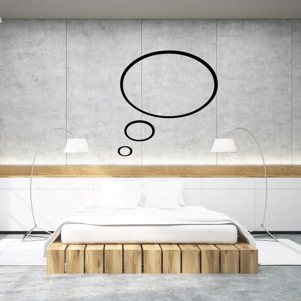 Black thought bubble decal with oval outline and dot accents