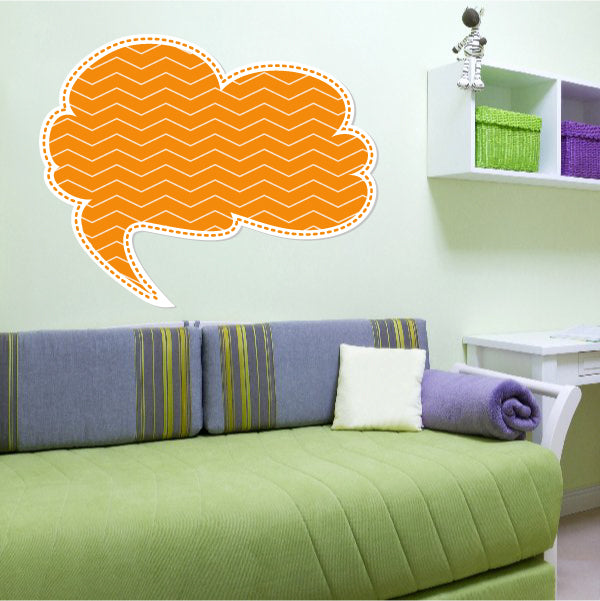 Orange cloud speech bubble sticker with white dashed border and chevron pattern