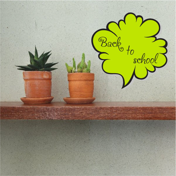 Lime green flower-shaped bubble sticker with 'Back to school' text