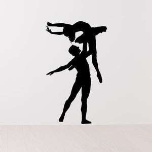 Ballet dancer wall decal with two black silhouettes posed overhead