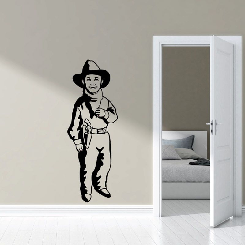Kids cowboy vinyl wall decal, black silhouette of a standing cowboy boy