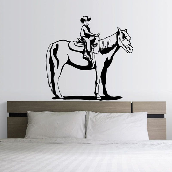 Kids cowboy wall decal with horse silhouette, black vinyl outline