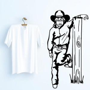 Kids cowboy wall decal: black vinyl outline of a cowboy holding a rope