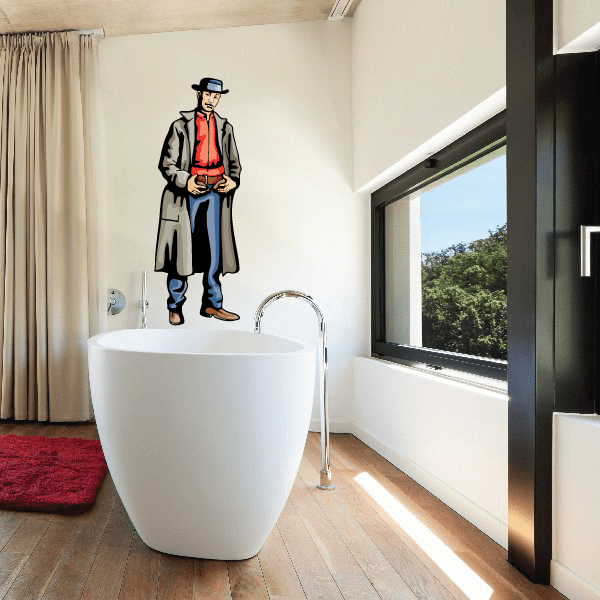 Cowboy sticker of man in gray coat and red shirt, black hat and boots
