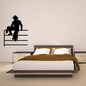 Cowboy wall decal: black rider silhouette on fence slats, vinyl sticker