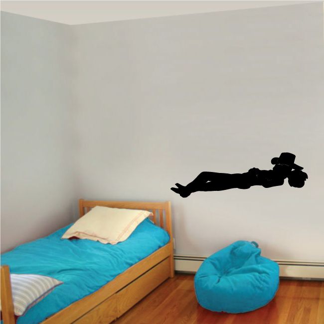 Black cowboy wall decal with hat and outstretched arm